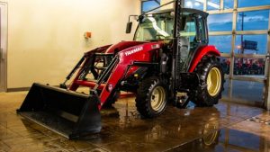 Yanmar dealership customizes tractor to enable wheelchair accessible operation