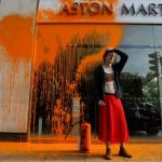 Aston Martin showroom hit as UK vows action on climate protests