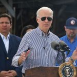 Biden tours Ian damage in Florida with DeSantis feud on hold for now