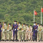 Parade by disciplined services hails national day in HK