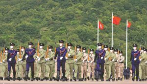 Parade by disciplined services hails national day in HK