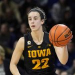 No. 4 Iowa upset by Kansas State, and possibly loses All-American Caitlin Clark to ankle injury