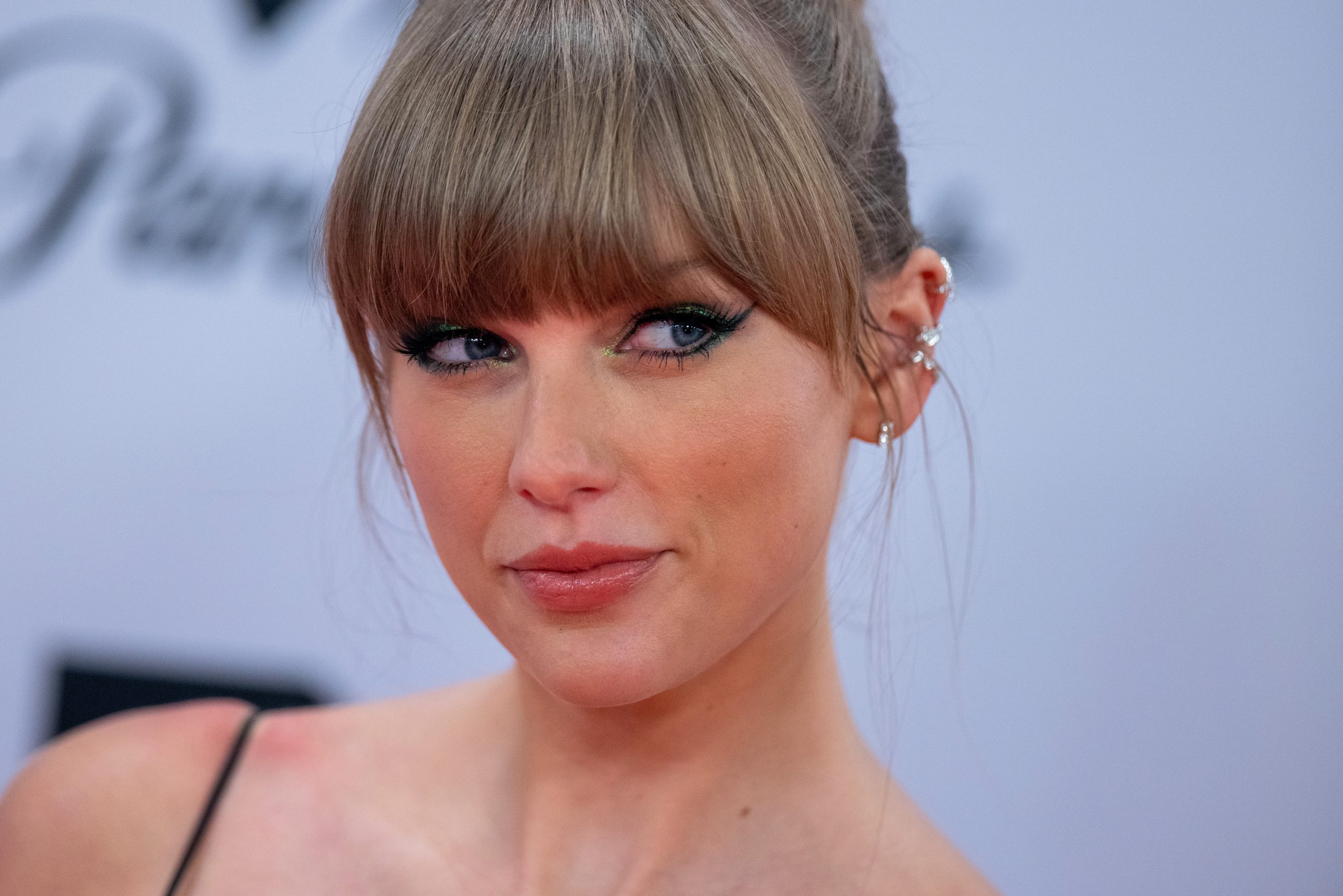 Taylor Swift Made the Europe Music Awards Shimmer in a Sheer Dress and Bodysuit Combo—See Pics