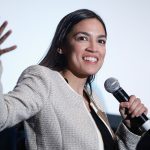 AOC Accuses DeSantis, Abbott of ‘Crimes Against Humanity’ for Migrant Stunt