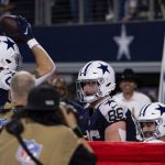 Cowboys tight ends win Thanksgiving with their ‘whack-a-mole’ Salvation Army celebration