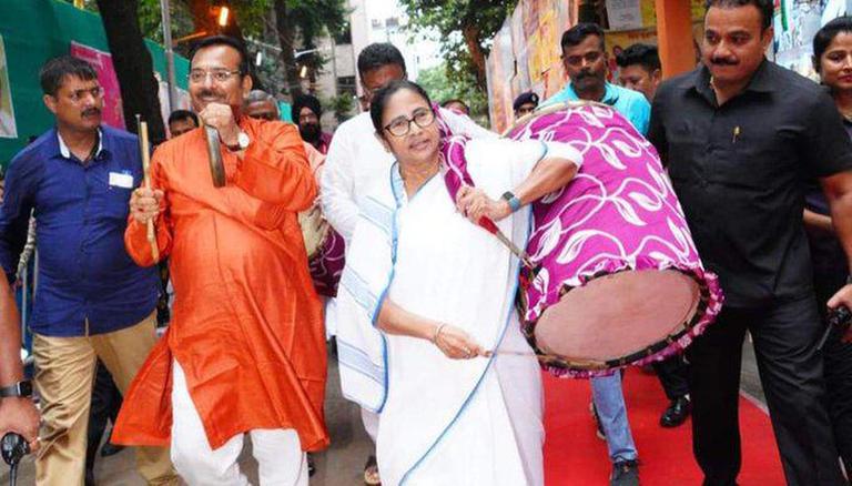 CM Mamata dives into festive spirit, plays dhak at Kolkata’s Suruchi Sangha Pandal; watch | India News