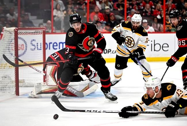 Senators put on offensive show in beating Bruins 7-5 for first win