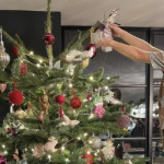 Amanda Holden shows off huge Christmas tree with daughters at London home