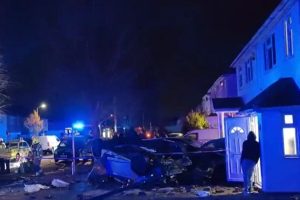 Two injured in horror crash after car flips into house in icy west London