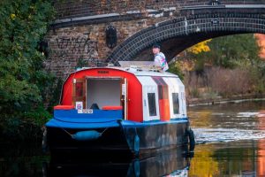 Canal boat home called Wiggles which looks like a tube train can be yours for £20,000