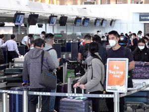 Hongkongers rush to the airport as Covid rules ease