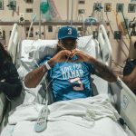 Damar Hamlin posts photo from hospital bed rooting on the Buffalo Bills a week after his on-field collapse