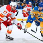 FLAMES FALL TO BLUES