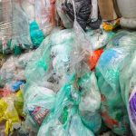 Coles and Woolworths offer to take responsibility for massive REDcycle plastic stockpile