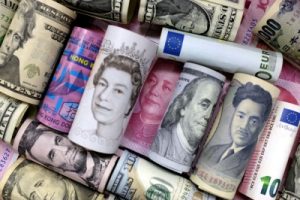 Dollar slides, yuan gains on China PMI; hot inflation lifts euro