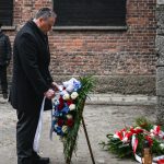 Auschwitz anniversary is marked as Europe’s peace is again shattered by war