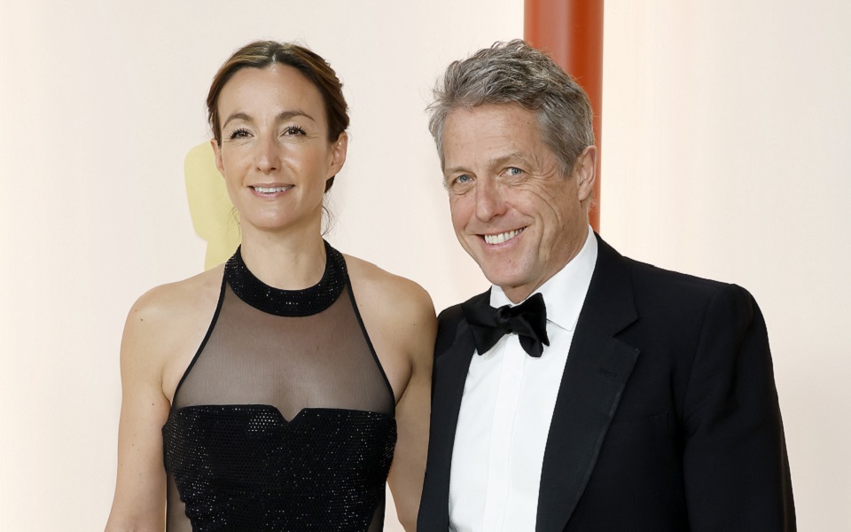 Hugh Grant’s awkward Oscars red carpet interview is going viral