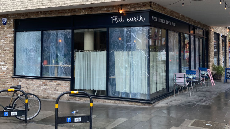 East London pizzeria Flat Earth launches crowdfund after vandal smashes windows