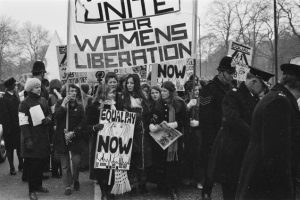 What are the origins of International Women’s Day?