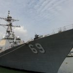 China says it warned US warship to leave S. China Sea, US denies claims