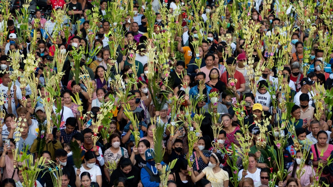 Filipino Catholics mark Palm Sunday praying for Pope Francis’ health as pontiff battles through Mass in Rome