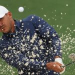 Heavy rain abandons play as Koepka leads Masters