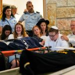 London rabbi breaks down during funeral for daughters killed in West Bank shooting