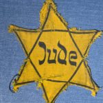 Nazi yellow star badges part of long history of forcing Jews to identify themselves