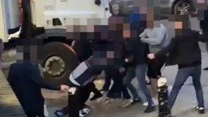 Shocking moment ‘Coventry and Brentford fans’ fight in street with glasses thrown and KOed man kicked on floor