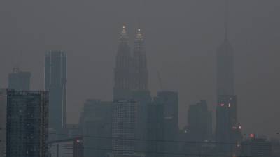 Health experts: Celebrate but stay vigilant of Covid-19, haze