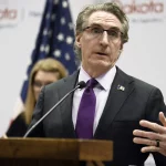 North Dakota governor signs law limiting trans health care