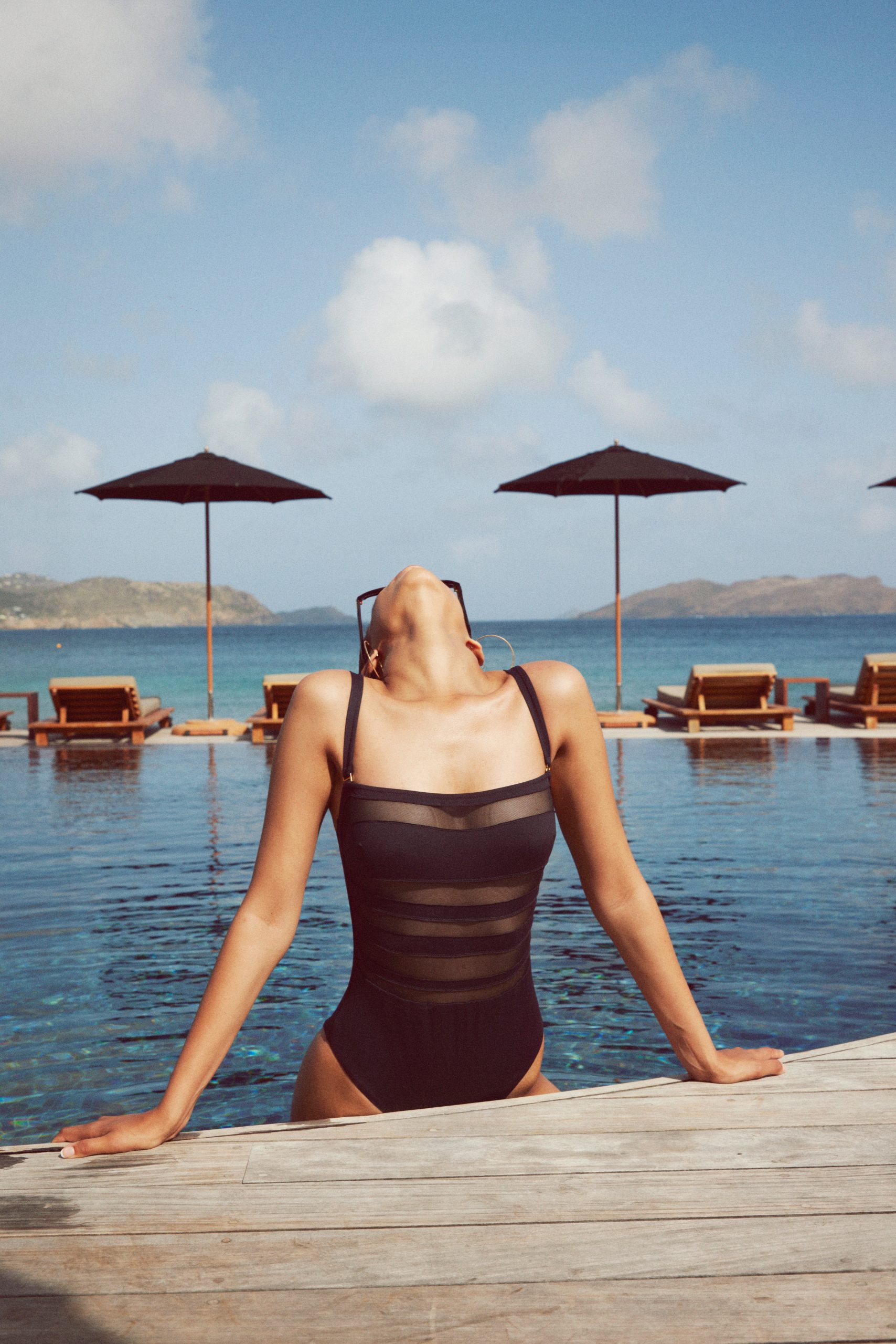 24 Black Swimsuits That Will Always Be In Style—From Strappy Bikinis to Minimalist One-Pieces