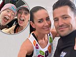 Mark Wright and Kirsty Gallacher beam as they get ready for the start of the London Marathon