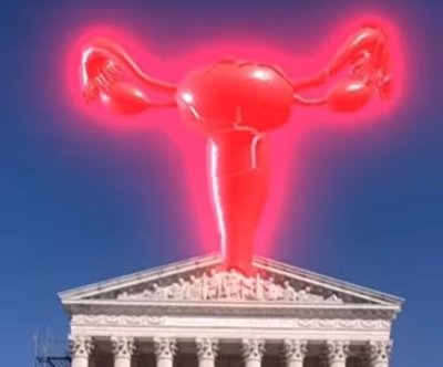 Artist Nancy Baker Cahill creates AR art of uterus projected over U.S. Supreme Court