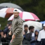 Koepka toughs it out to lead PGA Championship by a stroke over Canadian Conners