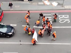 Watch: Just Stop Oil activist thrown to the ground by angry passer-by near Tower of London