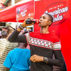 Introducing American Cola: The Bold and Refreshing New Product by Planet Bottling Company