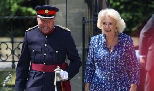 Queen Camilla dons blue £685 Samantha Sung dress to visit the Garden Museum today