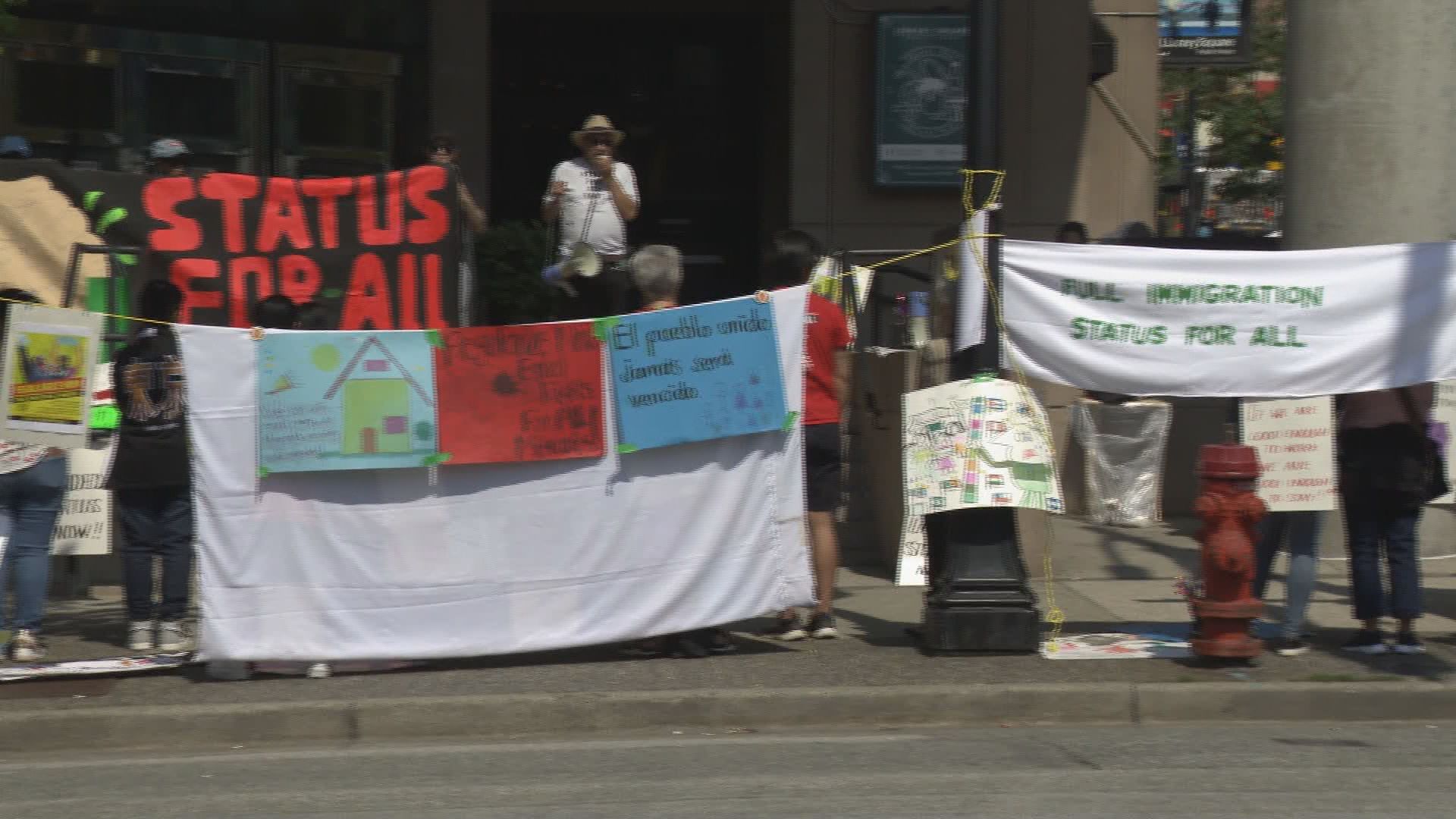 Downtown Vancouver protesters demand action on residency status 