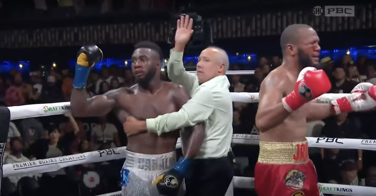 Video: Carlos Adames scores controversial knockout to retain title, opponent Julian Williams calls ref ‘terrible’