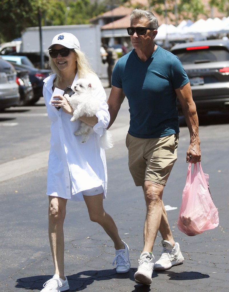 Heather Locklear appears happy and healthy with fiancé Chris Heisser after ‘meltdown’ photos