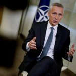 NATO wants to fight climate change. Its chief tells AP the trick is to make armies green but strong