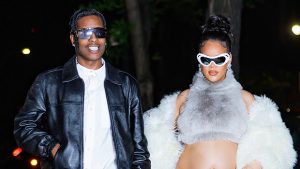 Pregnant Rihanna Bares Baby Bump As She & A$AP Rocky Match In Denim At Pharrell’s Louis Vuitton Show