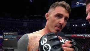 Aspinall calls for Jones shot after beating Tybura at UFC London