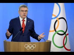 IOC’s Bach says Russia athletes’ respectful conduct key to Paris decision