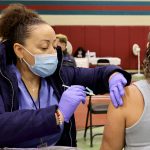 COVID vaccine program for uninsured could be late to pharmacies