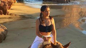 Salma Hayek showcases her sensational figure in bra top as she rides horseback during dreamy Mexican vacay