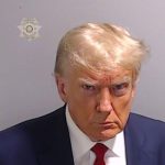 Make America Glower Again!  A Mugshot For The Ages