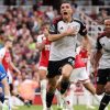 Arsenal held by 10-man Fulham after Aaron Ramsdale error