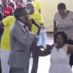 Watch a video of a PASTOR claiming that he is speaking to God on the phone during a live church service as his brainwashed congregants celebrate (VIDEO).